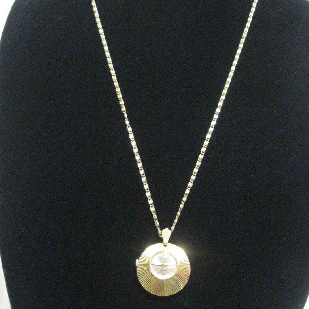 Ladylike 2-Sided Crest Pendant Watch Gold Sunburst Swiss Made on 26" chain